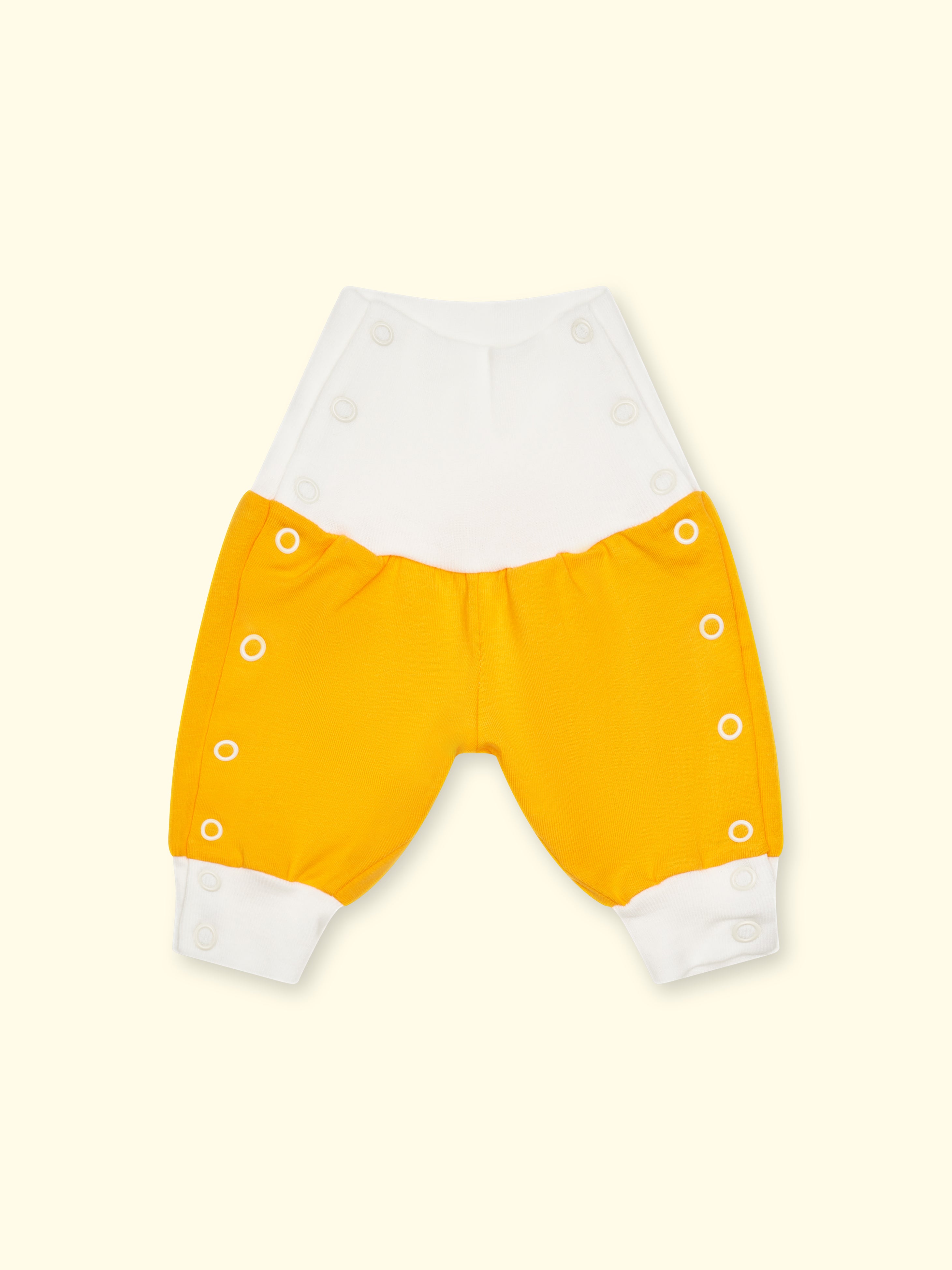 Pantalon jersey pour prématurés et bébés avec boutons pression - crème/mandarine